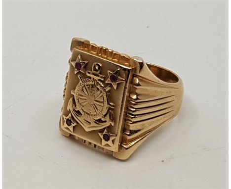 A 14ct. gold and ruby set gentleman's navy emblem ring, cast and engraved capstan wheel and anchor with single round cut rubi