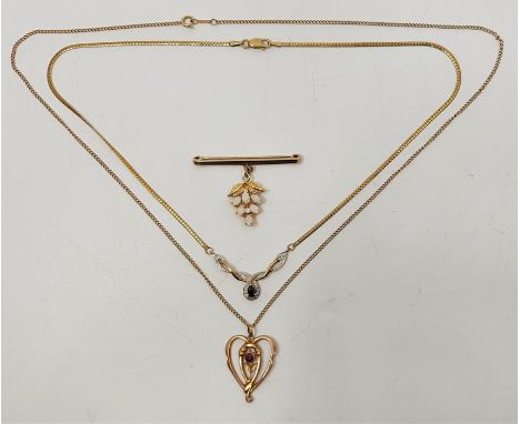 A 9ct. gold and sapphire pendant choker necklace, the pendant having having pendelque cut central sapphire with single diamon