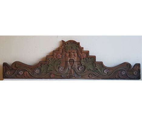 A 19th century Scandnavian&nbsp;carved and painted panel, length 124cm.