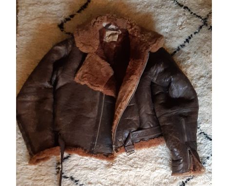 A WW2 PERIOD RAF Interest flying jacket belonging to Jack Venning, numbered 460, dated 1944 and with Military arrow.