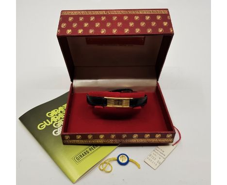 An 18ct. gold Girard-Perregaux ladies' wrist watch, c.1975, manual movement, having signed textured rectangular dial with gol
