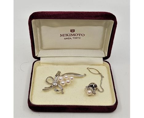A Mikimoto white metal and cultured pearl floral spray brooch, length 60mm, signed and impressed "S", in Mikimoto box, togeth