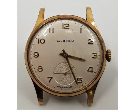 A Garrard 9ct. gold gentleman's wrist watch, c.1976, manual movement, Unitas cal.6325, having signed white dial with gold Ara