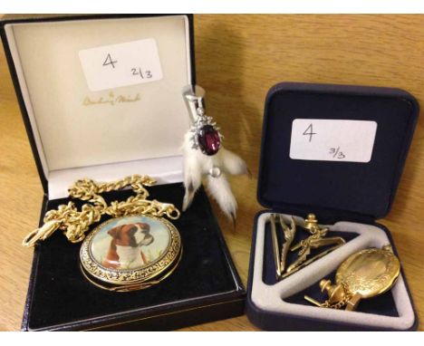 A Danbury mint boxed pocket watch with boxer dog enamel design together with a stags head and purple stone rabbits foot brooc