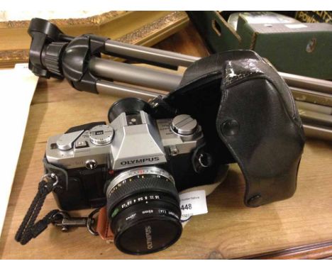 An Olympus OM30 SLR camera with 50mm lens and vianco tripod