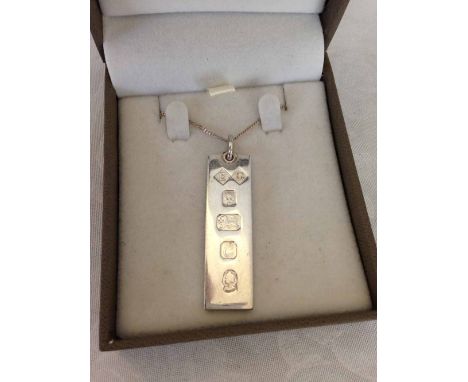 1977 Jubilee London hallmarked silver ingot, weight approx 15.7g / 0.5 t.oz, on silver chain.
