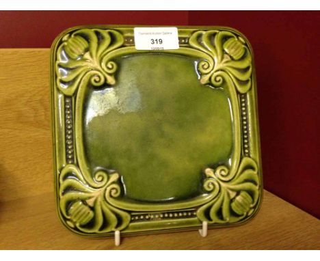 A Carter & Co Poole early ceramic pot stand/tile.