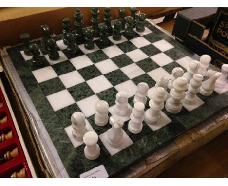 A boxed Marble chess set & marble board.
