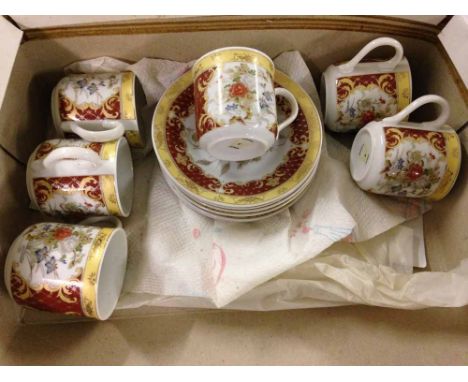 A set of 6 Japanese Tanaka coffee cups & saucers.