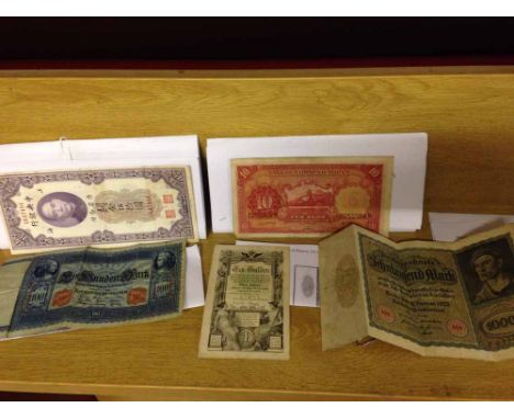 5 vintage foreign bank notes to include German marks and Chinese notes.
