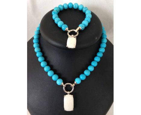 Turquoise bead necklace with matching bracelet, each with large cut snow quartz stone pendants set in hallmarked silver mount