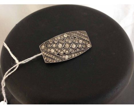 Art Deco design brooch set with diamante stones, curved rectangular shape, approx 4cm x 2cm - tests as silver.