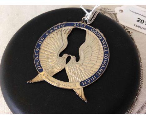 A Wallace Sterling silver 1973 large christmas tree medallion 5.5cm diameter on silver chain. Approx 38.6g.