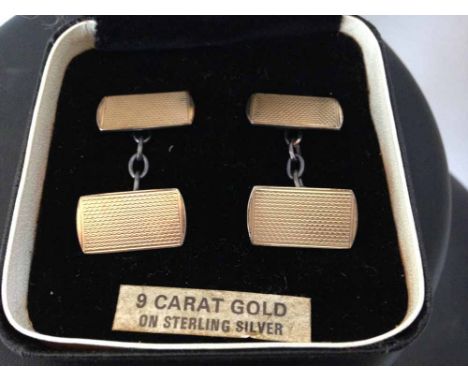 A pair of 9 carat gold over silver gents cuff links.