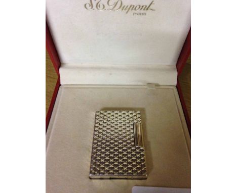 A vintage Dupont Paris silver colour lighter in originalbox with paperwork. Reg No. 11DED38.