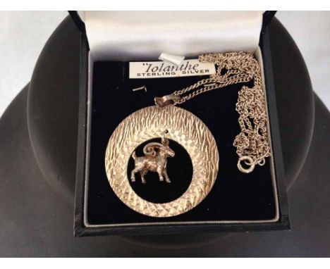 Hallmarked silver circular pendant with a goat suspended in the centre (probably capricorn birthday sign) on a chain. Total w