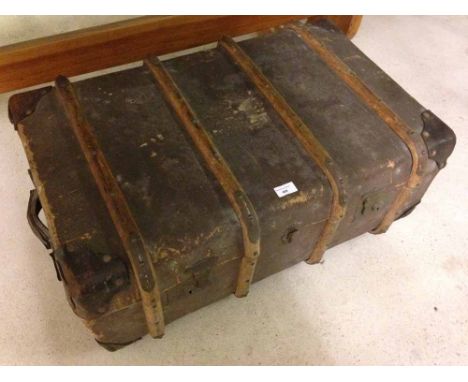 A vintage wooden banded suitcase