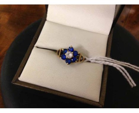 9ct HM gold ladies dress ring set with blue & white stones, size I