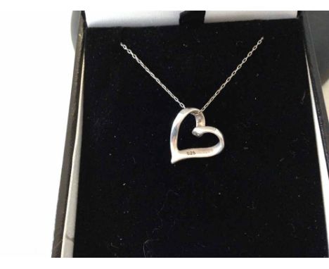 925 silver floating heart pendant on silver chain.