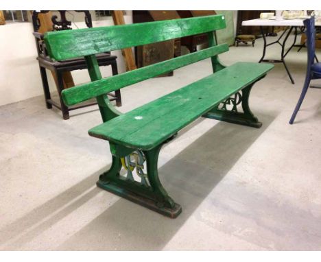 A vintage Great Eastern Railway platform seat, cast iron ends with GER initials, one piece wooden seat with 2 wooden slats to