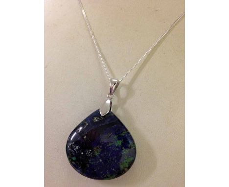 Blue & green polished stone pendant on a silver chain.