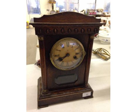 Victorian wooden mantle clock in working order.