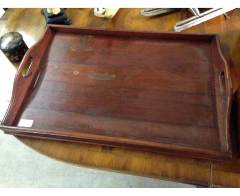 A vintage wooden butlers tray.
