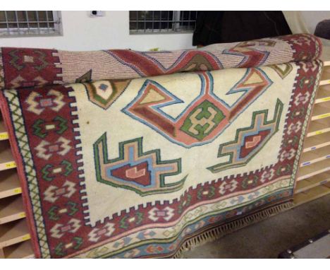 A vintage Selcuk Turkish wool rug. 242 x 158cm (3.82m²).