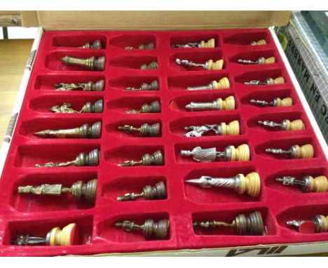 A boxed Medieval figures chess set - metal figures on wooden bases - no board.