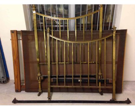 A vintage brass single bed with sprung base