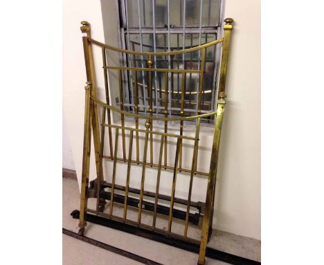A vintage brass single bed