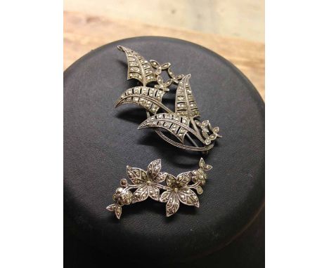 Vintage silver & marcasite brooch with fern design together with another silver & marcasite brooch with a flower design.