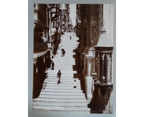 An Edwardian album of photographs, including 8x11¼ views of Malta by R Ellis and Grand Studio, Corfu, Gibraltar, Geneva, Napl