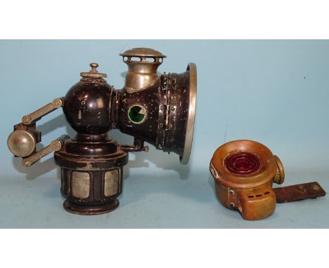 A J Lucas Ltd 260 Colonia carbide bicycle lamp and a smaller brass-back light, (a/f), (2). 