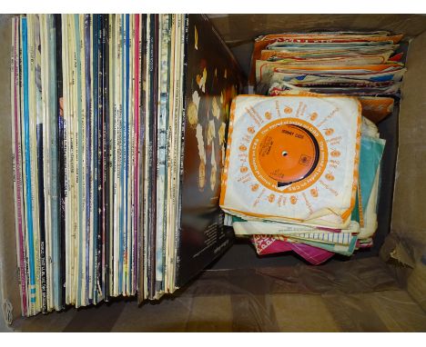 A collection of approximately 120 LP's, mainly pop, M-o-R and a quantity of 45RPM records. 