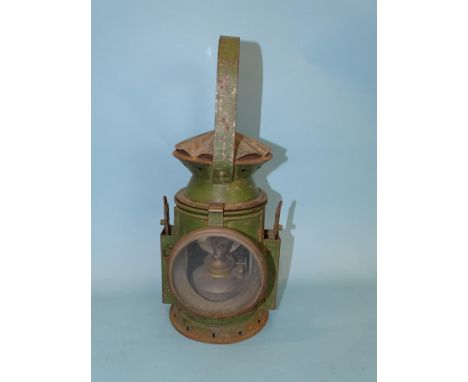 A WWII period green-painted military issue railway guardsman's lamp by C Eastgate &amp; Sons, Birmingham, with military issue