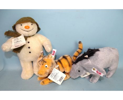 Steiff, three soft toys: Tigger, Eeyore and The Snowman, all with buttons, cloth and card labels, (3). 