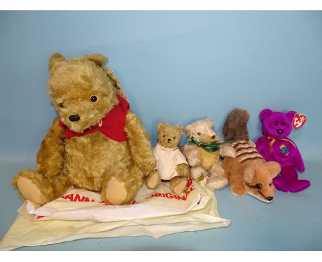 A Gund 'Winnie-the-Pooh', a small Herman teddy 'Agnes', 165/1000 and three other soft toys, (5). 