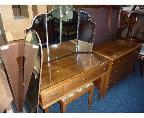 A TEAK DRESSING TABLE, matching chest of three drawers and stool, together with a triple mirror and a wall mirror (5)