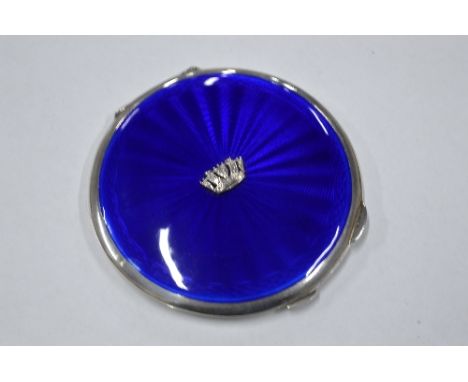 A SILVER ENAMELLED COMPACT, with navy blue guilloche enamel with central crown detail, mirror missing, hallmarks for Birmingh