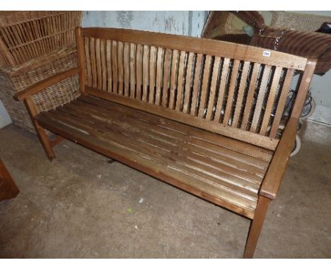 A TEAK GARDEN BENCH