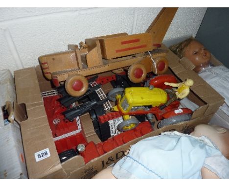 AN UNBOXED VINTAGE PLASTIC ROCKET LAUNCHING BASE, C 1950'S/60'S, no makers mark and with a Tudor Rose plastic tractor and woo