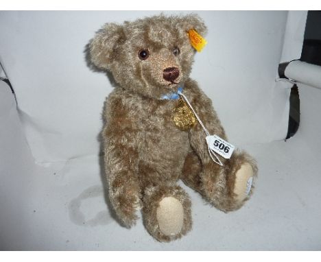 AN UNBOXED STEIFF BROWN PLUSH BEAR , a 2002 bear produced exclusively for Danby Mint, complete with medallion, height approxi