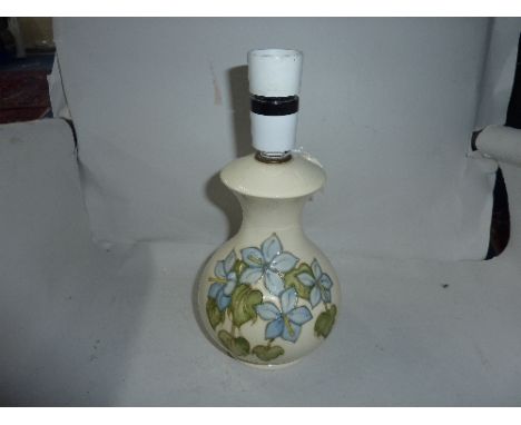 A MOORCROFT POTTERY LAMP BASE, Blue Campanula pattern, impressed mark to base, height approximately 24cm (top of fitting) (5)