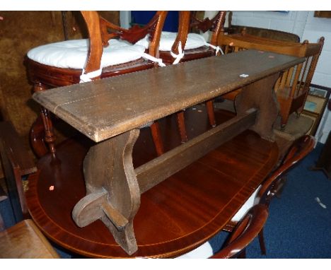 AN OAK BENCH, and an oak barley twist gate leg table (s.d.) (2)