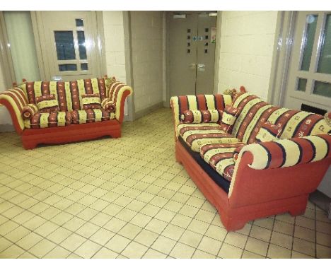 A PAIR OF KNOLL TWO SEATER SOFAS, and a pouffe with terracotta, lemon and blue upholstery (s.d.) (3)