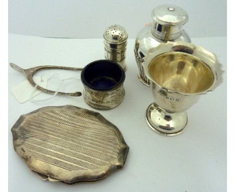 A COLLECTION OF SILVER comprising monogrammed JPA egg cup, hinged wishbone nips, open blue glass lined salt pepper, white met