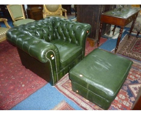 A GREEN LEATHER CHESTERFIELD STYLE ARMCHAIR, and a pouffe (2)
