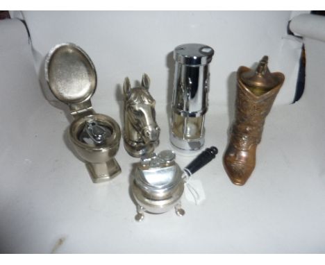 FIVE NOVELTY LIGHTERS, to include toilet, horses's head, boot and miners lamp 