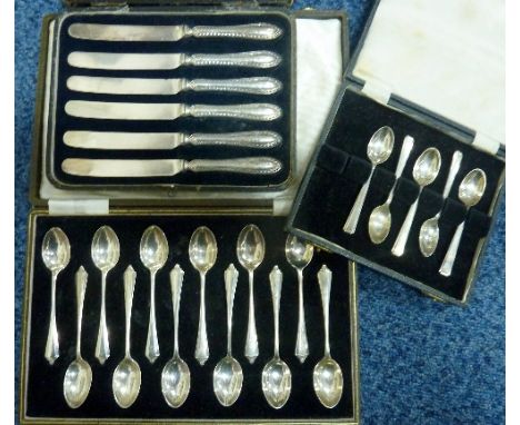 A CASED SET OF SIX SILVER COLOURED ENAMEL HANDLED COFFEE SPOONS, a cased set of six soldier finial teaspoons (one detached) a